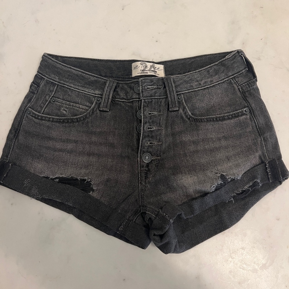 Size 24. Free People Dark Wash Denim Shorts.